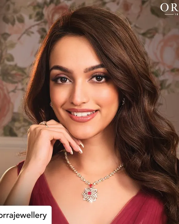 A stunning final shot from a jewelry campaign. The makeup is clean, elegant, and designed to complement the diamond necklace, enhancing the model's beauty without overpowering the product.