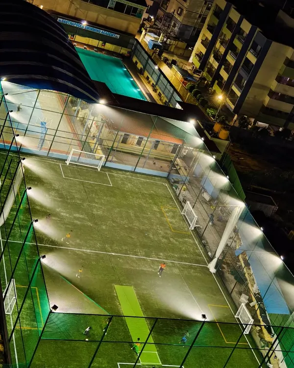 An aerial view of our Sportonix Sports Arena at night. The brilliantly lit football turf is ready for action.