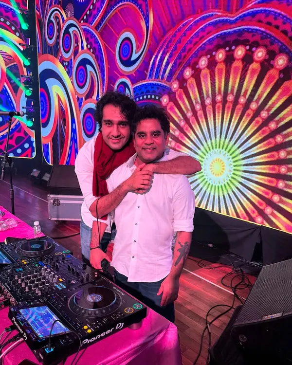 Our team is a family of sound. This is me with my percussionist, my partner in creating the high energy vibe at every show. We work together to make every performance unforgettable.
