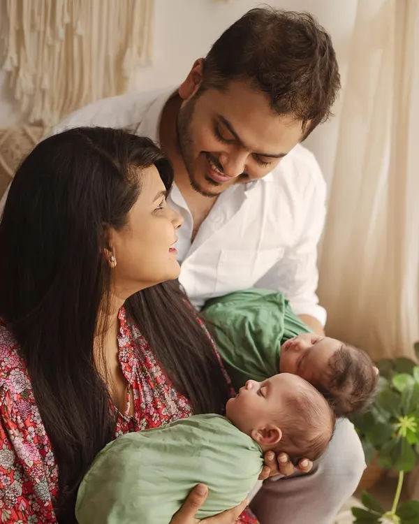 A family portrait with newborn twins is twice the blessing. I love capturing the overwhelming joy and love as parents hold their two new babies. My studio sessions for twins are always handled with extra care and patience.