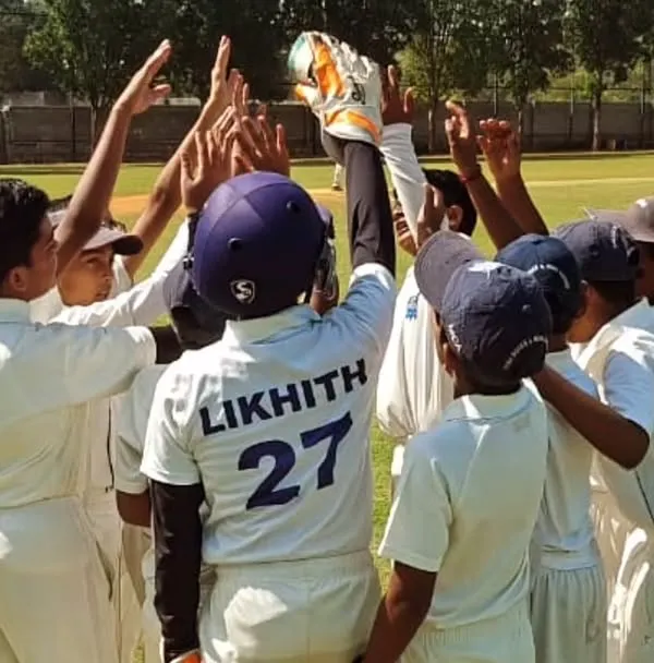 A team huddle full of energy and celebration during the Christmas Cup U-12. This is the spirit we foster in all our teams.