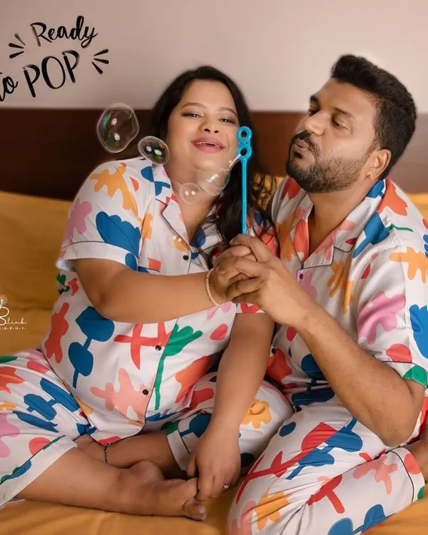 Fun and playful moments in matching pajamas! This at-home session was all about capturing the couple's fun-loving personalities as they get "ready to pop".