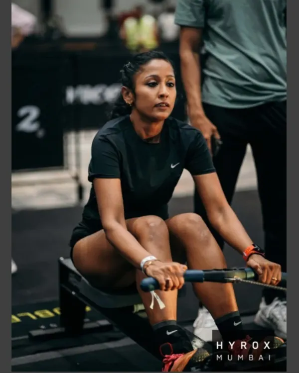 Locked in on the rowing machine during a Hyrox competition. This is a full-body effort that tests cardiovascular capacity and muscular endurance, a key station we train specifically for.