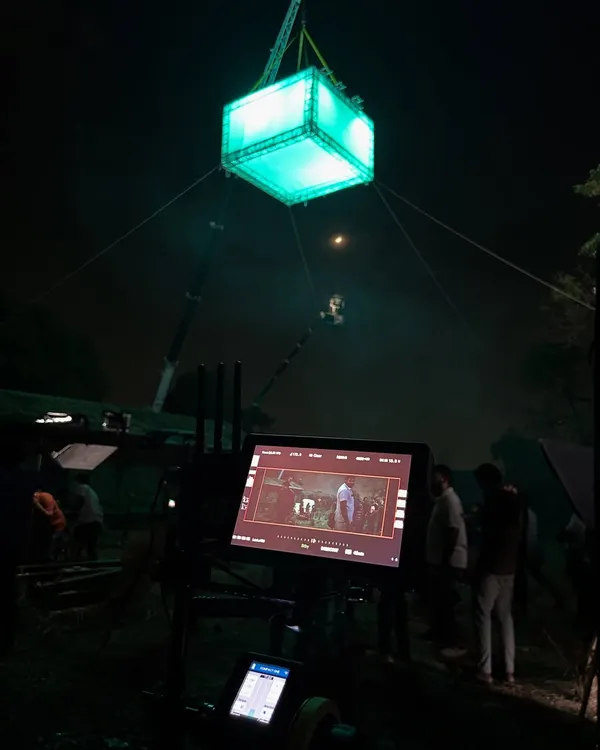 A view from behind the monitor on the set of 'Kishkindhapuri'. This shot shows the final image on screen, with our crane-mounted, color-changing moonbox visible in the background.
