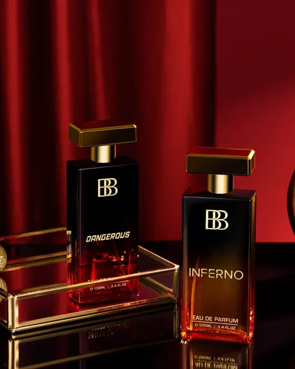 A Valentine's Day campaign shoot for a perfume brand, designed to evoke romance and sophistication. We used a controlled lighting setup with deep reds and golds to enhance reflections and create a feeling of elegance and intensity.