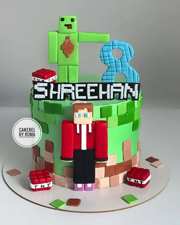 A classic Minecraft cake for Shreehan's 8th birthday. I built this world with edible blocks, TNT, and fondant figurines of popular characters, ready for a gaming adventure.