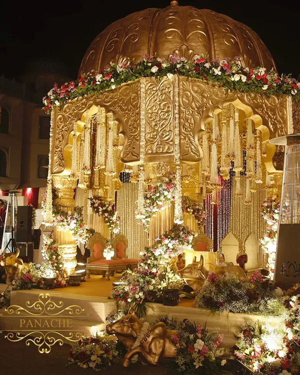 This majestic dome mandap, bathed in gold and adorned with cascading florals, is where we turn wedding dreams into royal reality. It represents our commitment to creating breathtaking, heritage-inspired settings for your most sacred vows.