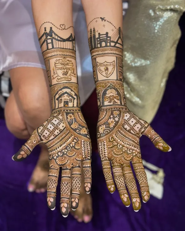 This is what I mean when I say your mehendi should tell your story. For this bride, we included the city skyline where she met her partner, their favorite football club logo, and even a drawing of their home. Every detail is a memory.