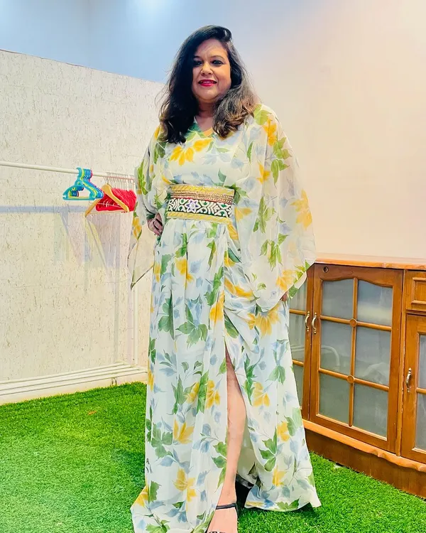 This breezy and beautiful kaftan-style dress was upcycled from a lightweight floral saree. I added a custom embellished belt to cinch the waist, creating a flattering and comfortable outfit perfect for a resort holiday or a casual party.