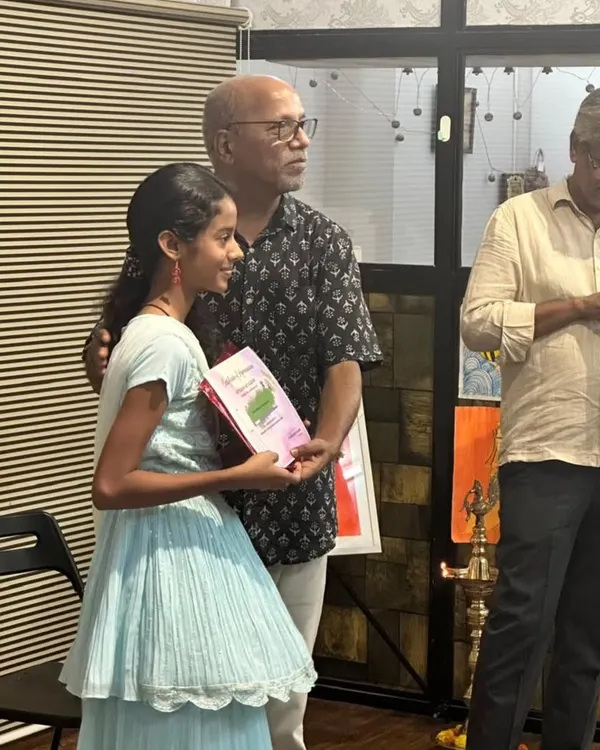 I am so proud of my student, Saanvi Rane, a 7th grader who received an 'A' grade in her grade exam. Here she is receiving her certificate at our annual prize distribution ceremony.