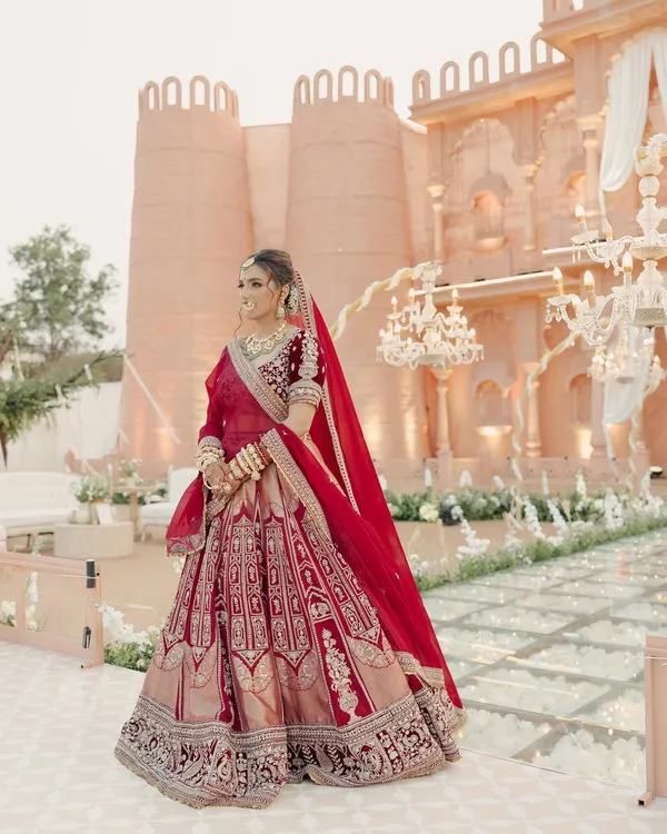 Janvi was the picture of regal grace on her wedding day. Her classic red lehenga called for a makeup look that was both timeless and radiant, enhancing her features without overpowering her magnificent bridal attire.