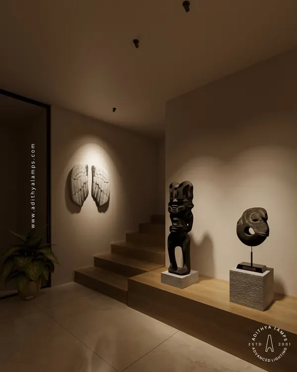 Our 'Deep' downlights are used here to create a dramatic gallery effect in a residential hallway. They precisely spotlight sculptures and wall art, turning a simple corridor into a personal art exhibition.