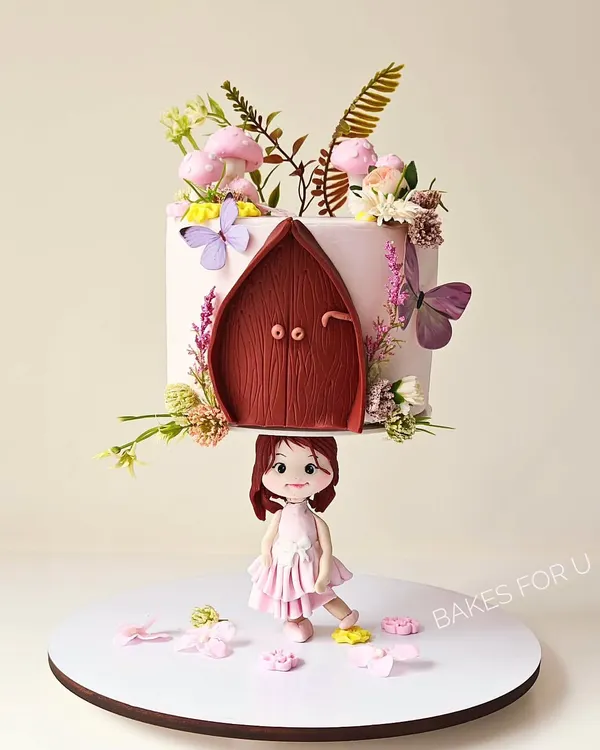 This is where baking meets magic. I designed this gravity-defying cake to create a show-stopping centerpiece, featuring a fairy house that appears to float, supported by a delicate, handcrafted figurine. It’s a perfect example of how I can turn a creative vision into an edible reality.