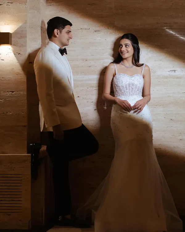A romantic shot of a cocktail bride. I styled her hair in a simple and elegant half-updo to complement her beautiful white gown and let her natural beauty shine.