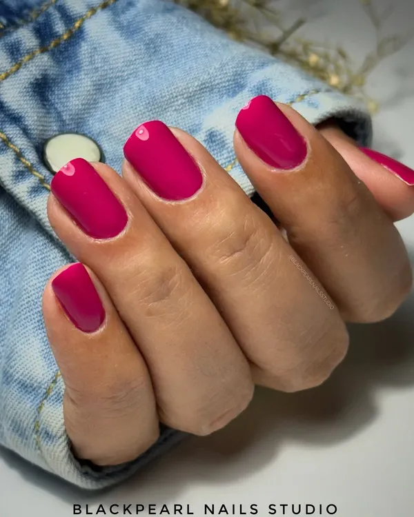 This beautiful manicure was done using BIAB (Builder in a Bottle) with a vibrant pink gel polish. This combination provides incredible strength and durability, resulting in a flawless, glossy finish that lasts for weeks.