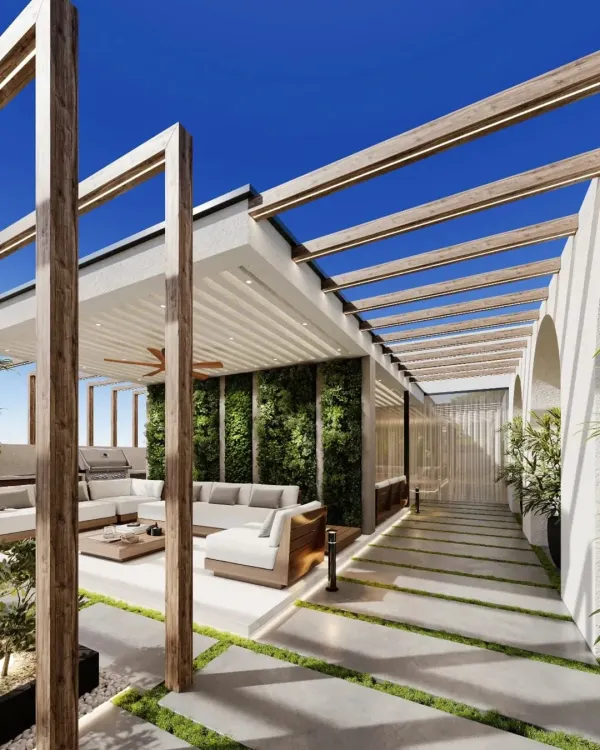 A stunning terrace design featuring a wooden pergola over a comfortable seating area. A lush vertical garden wall serves as a living art piece, while the layout provides a clear pathway and open space.