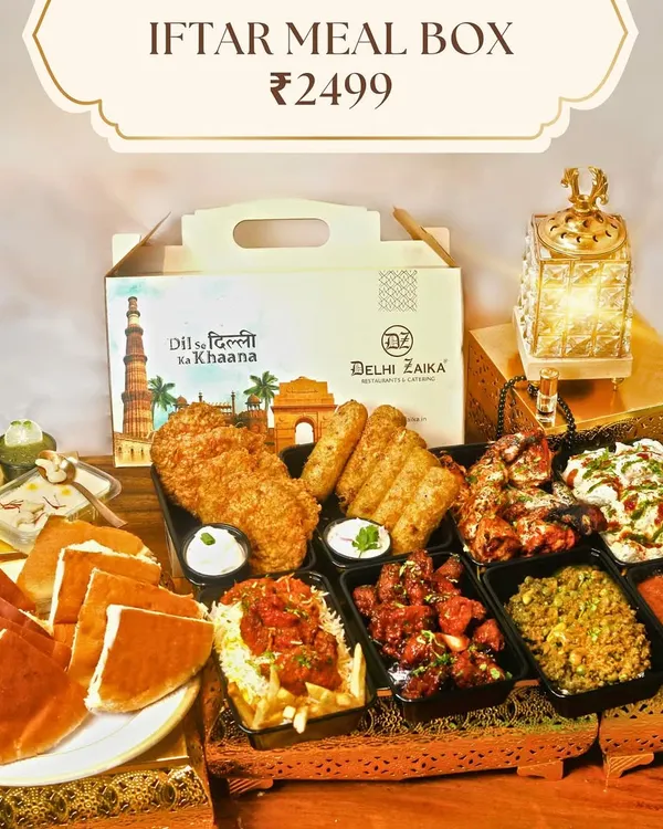 This is my Iftar Meal Box, a complete feast for 5-6 people priced at ₹2499. It's a 'Dil se Dilli ka Khaana' experience, packed with everything from Dahi Bhalla and Chicken Barra Cream to Mutton Keema, Chicken Sizzler Biryani, and desserts. It’s the perfect way to break your fast with family.