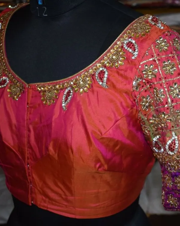 This custom-stitched silk blouse is the perfect example of my passion for detail. The intricate, handmade Kundan and zari work across the neckline and sleeves took over 15 days to complete, ensuring every single element was perfect for a special occasion.