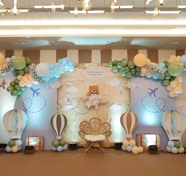 A full view of our 'Little Explorer is Landing Soon' theme. This setup features a vintage world map, hot air balloons, and adorable teddy bear pilots, creating an immersive experience for a travel-inspired baby shower.