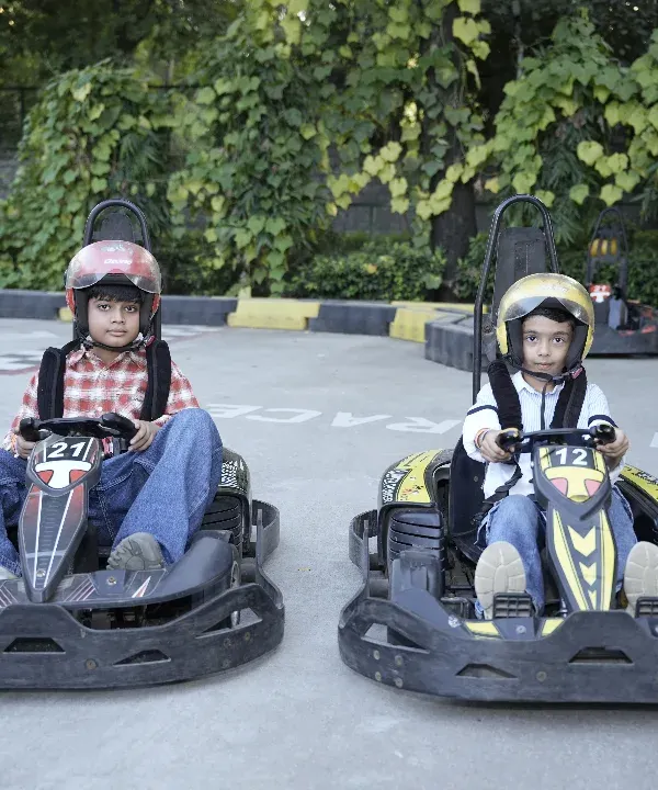 Ready, set, go! Our kid-friendly go-karts at the Punjabi Bagh location offer a safe and thrilling racing experience for young drivers, making any group outing an unforgettable competition.
