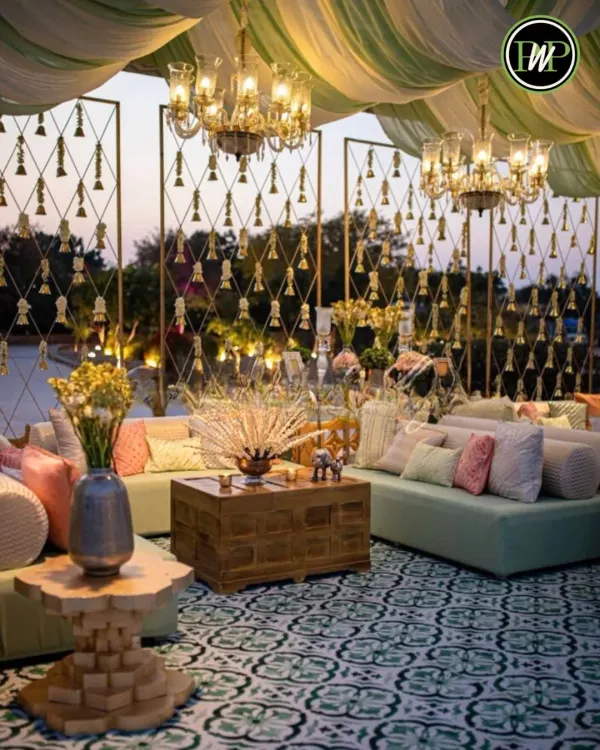 A comfortable and stylish lounge seating area for guests. I use a mix of sofas, cushions, and unique decor elements like this kalire wall to create inviting spaces.