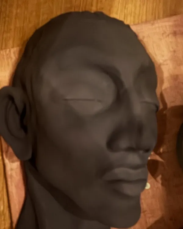 The evolution of a sculpture. This series shows a hand-built portrait bust from its raw clay form, to post-bisque firing, and finally with two different metallic glaze finishes.