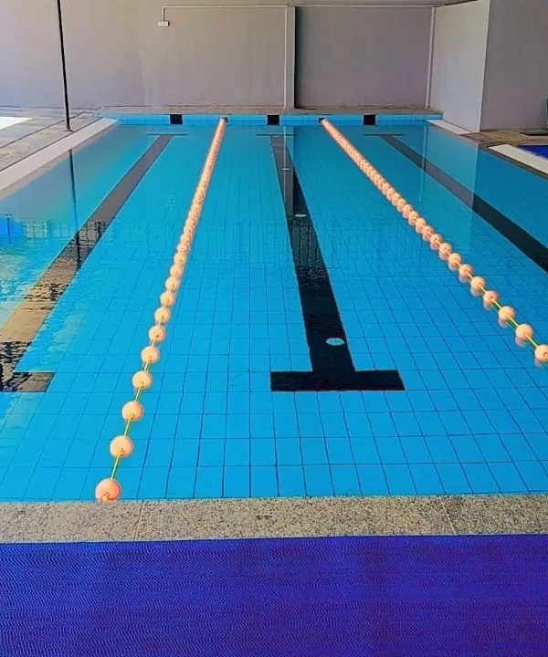 Our 15-meter pool is meticulously maintained to ensure the highest standards of cleanliness for every class. The lane dividers help structure our sessions, allowing for organized and effective group workouts.
