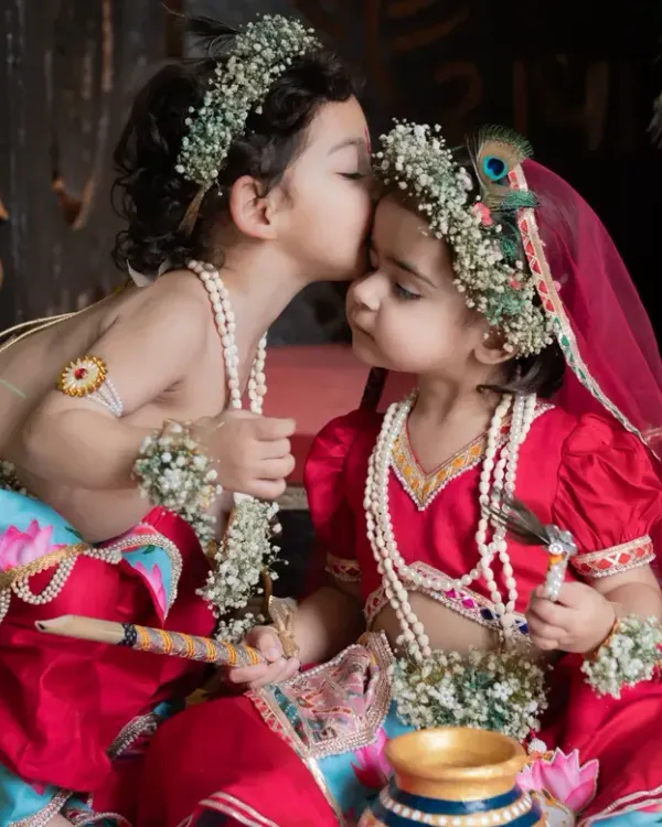 This is what it's all about. Capturing pure, unscripted moments of love between siblings during a special Janmashtami themed photoshoot. We create detailed, beautiful sets to make these memories truly magical.