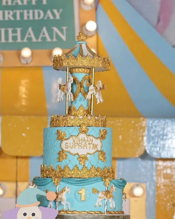This magnificent carousel cake was the centerpiece of Vihaan's carnival party. The intricate gold details and spinning horses made it a true work of art.