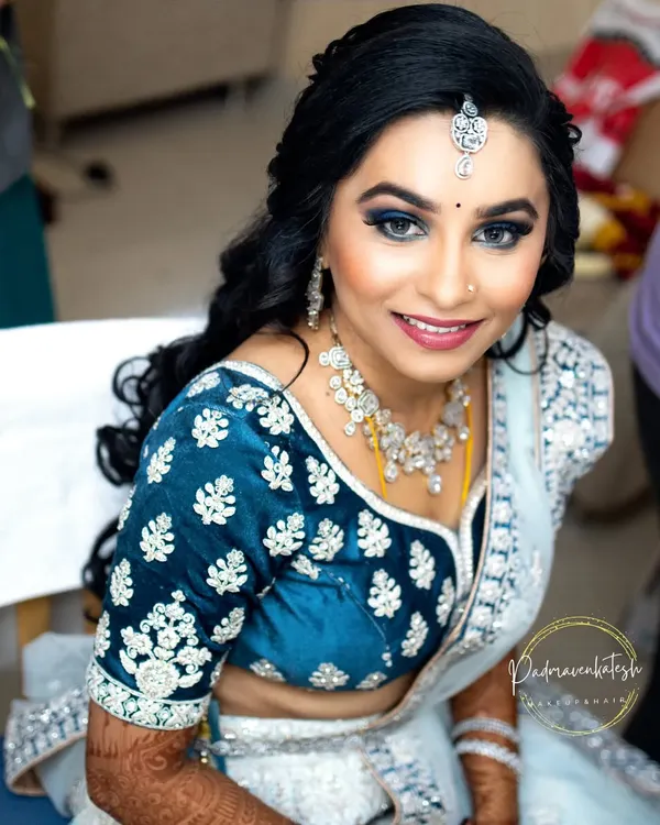 A close-up of the finished blue smokey eye look for a reception. I used high-quality pigments to ensure the color was rich and blended seamlessly, creating a captivating and glamorous effect.