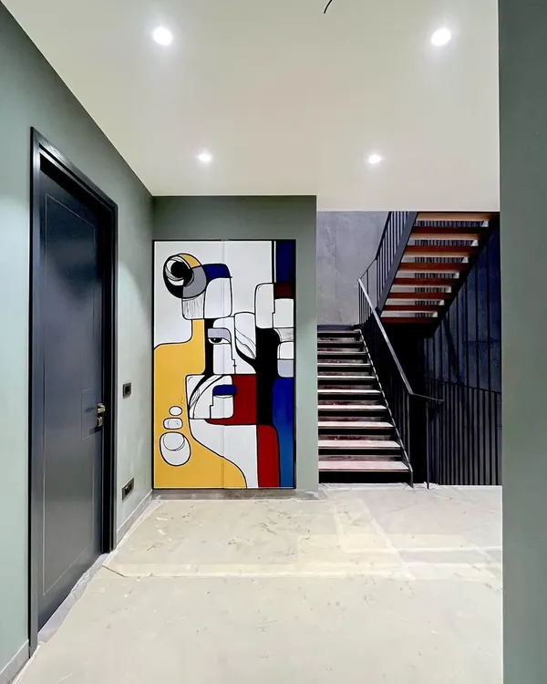 Art isn't just for walls. I hand-painted this wardrobe with a custom abstract design inspired by Picasso, turning a functional piece of furniture into a unique statement piece for a client's home.