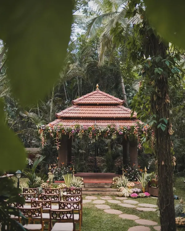 For this intimate home wedding, we created a beautiful mandap within a garden gazebo, surrounded by lush greenery. The setting feels both natural and sacred, proving that a smaller scale can be just as breathtaking.
