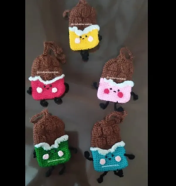 A colorful batch of our chocolate bar pouches, ready to be shipped. These fun, quirky pouches are great for holding small items and make for a very sweet gift.