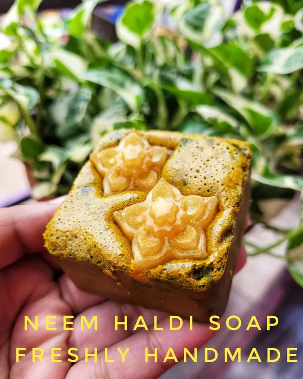 My Neem Haldi soap, intricately designed and packed with benefits. This soap is a powerhouse for clearing acne scars, preventing breakouts, and improving skin tone thanks to the natural properties of neem and wild turmeric.