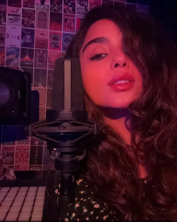 In my creative cocoon. This is a shot of me in the studio, surrounded by my gear. This is where I experiment with sounds and produce my own tracks, pouring my experiences into the music.