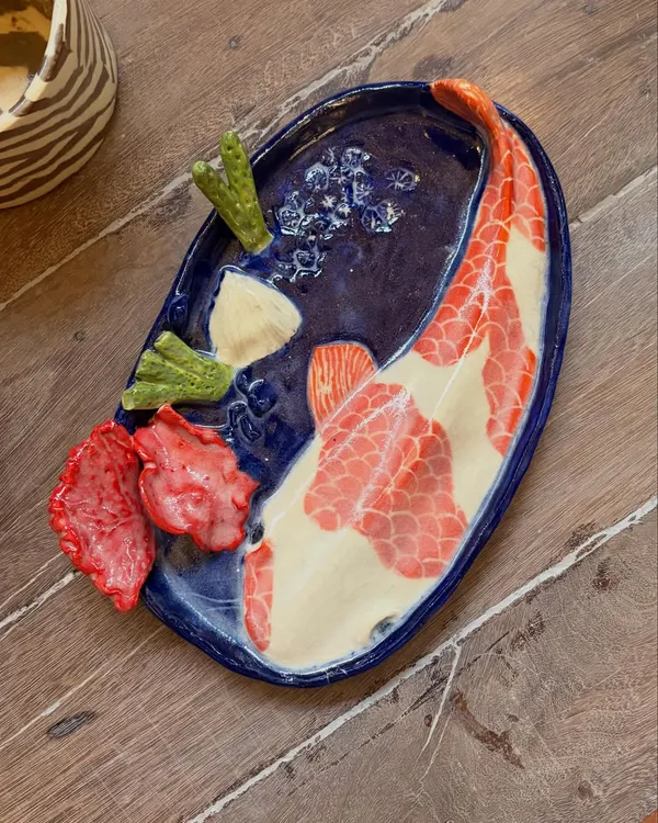 This incredible koi pond platter was made by Aarti, one of my beginner students. Her patience and attention to detail are just stunning. It’s a perfect example of how hand-building allows for such imaginative and sculptural work.