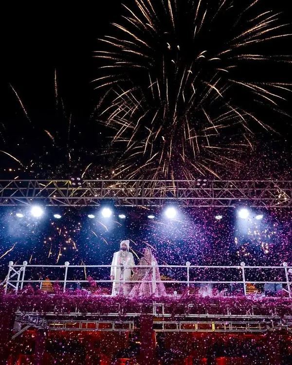 This is the moment that takes everyone's breath away. I design grand Varmala stages that combine dramatic lighting, floral abundance, and perfectly timed pyrotechnics to create a truly cinematic experience for you and your guests.