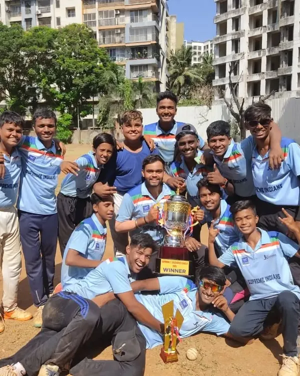 The winning moment. Supreme Indians celebrating with the trophy after a hard fought tournament. This is the result of all the sweat and effort put in during practice.