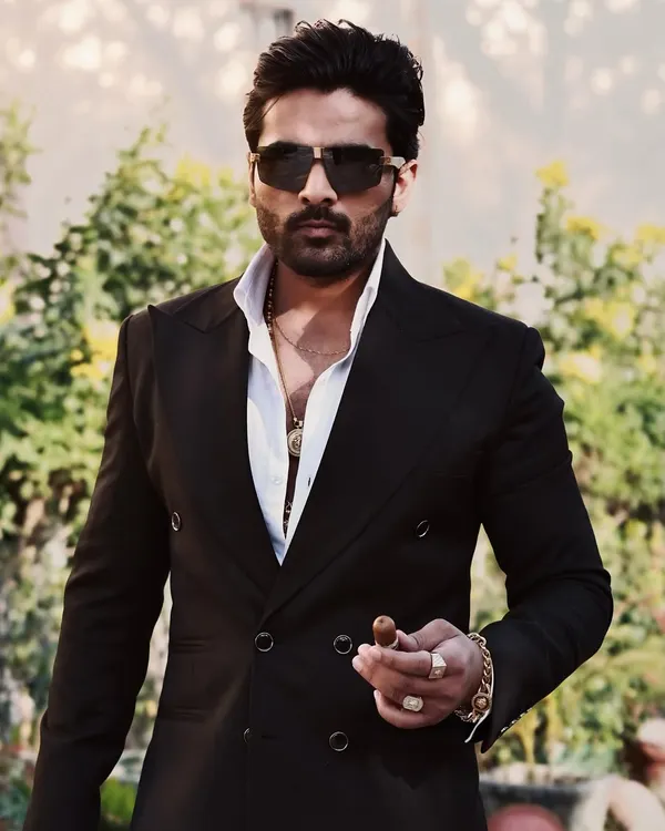Our client Mr. Vansh looking dapper and confident in our classic black double-breasted suit.
