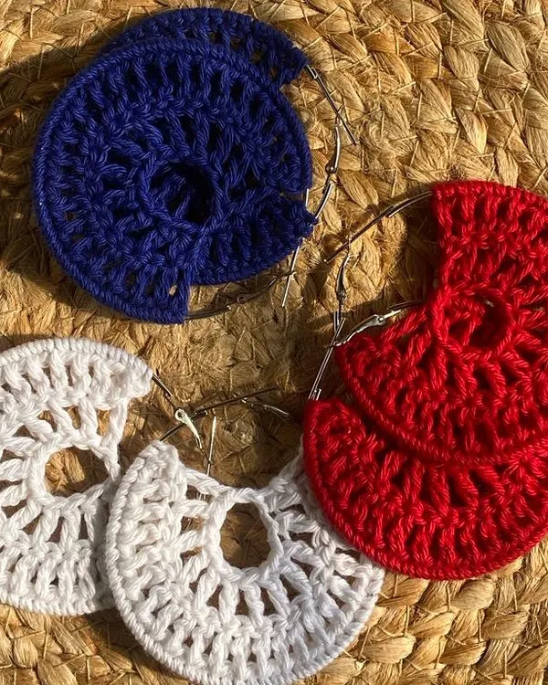 These are my 'Chand Baliyan' inspired crochet earrings. They are lightweight and can be made in a variety of colors like this vibrant red, white, and blue set.