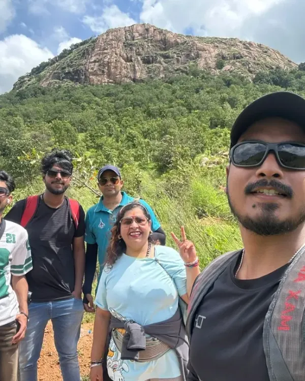 A quick selfie break during our Makalidurga trek. We make sure there's plenty of time to enjoy the journey, capture memories, and appreciate the stunning scenery with your colleagues.