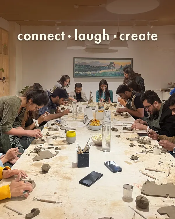 This is what our studio is all about: connection, laughter, and creation. Here, a corporate group is taking a break from their desks to get their hands dirty with a fun clay handbuilding session, a perfect team bonding activity.