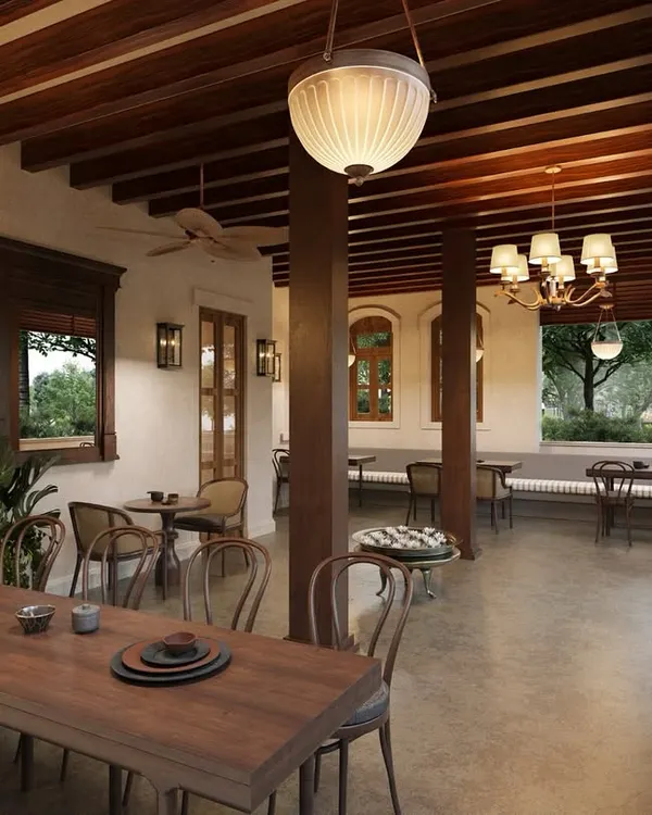 This is a 250-year-old heritage home I am restoring into a cafe in Alibaug. The design blends rustic charm with modern sensibility, using exposed wooden rafters, warm lighting, and natural materials to create a cozy, inviting space for coffee lovers.