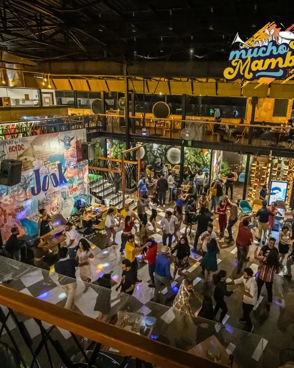 This is the heart of our Mucho Mambo nights. A packed floor with everyone lost in the music, showcasing the vibrant and energetic atmosphere we create every week at our Bangalore salsa socials.