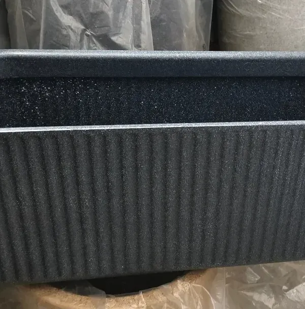 This is our Fiber-Reinforced Plastic (FRP) planter box. It's lightweight, extremely durable, and resistant to weather, making it a perfect choice for both indoor and outdoor gardens that require a modern, long-lasting solution.