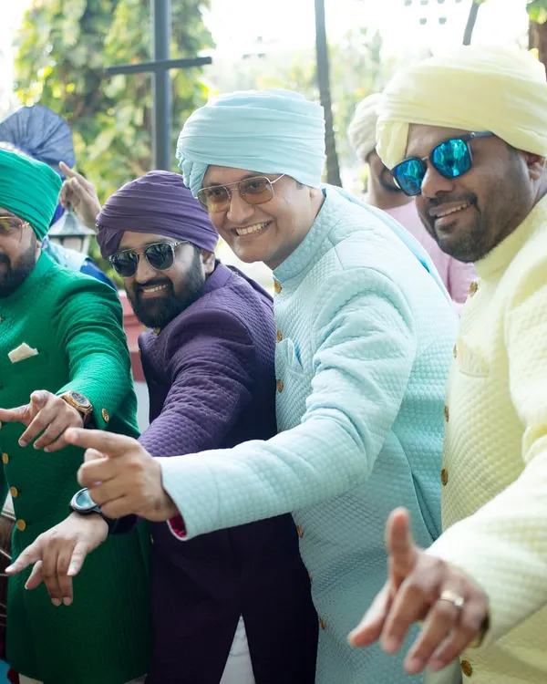 A vibrant baraat with the men of the family in synchronized outfits. We created these colorful, coordinated looks to bring a super cool vibe and create lifelong memories through photos.