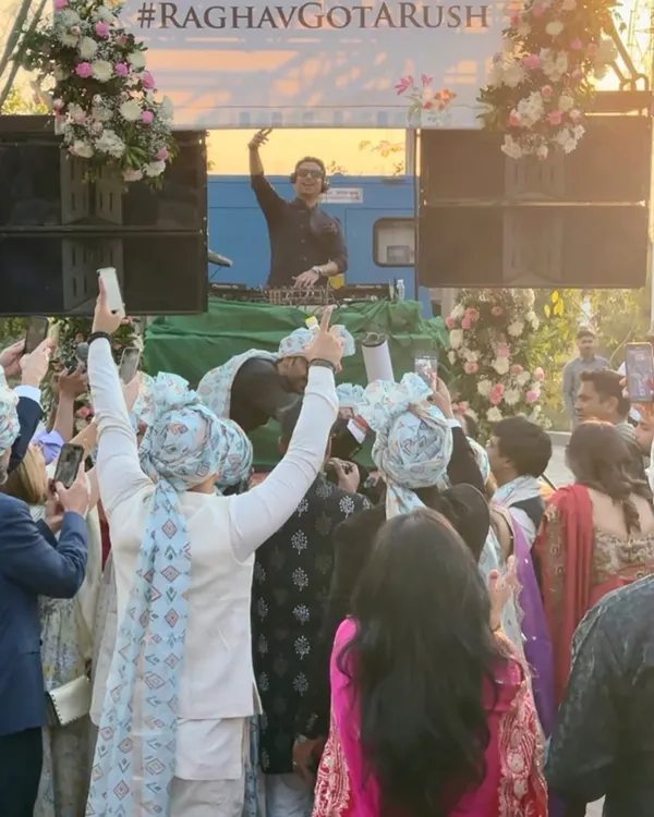 The groom's crew with their hands in the air, celebrating on the move. My DJ on Wheels setup ensures the baraat is an unforgettable, high-energy procession.