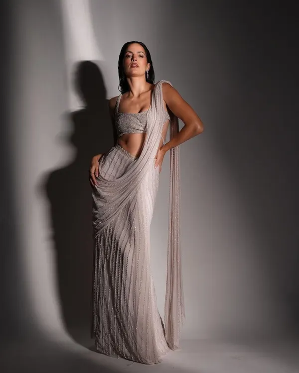 Here's a look from a shoot with the stunning Natasa Stankovic. I styled her in a contemporary, pre-draped saree that combines traditional elegance with a modern silhouette, perfect for creating a high-fashion statement.