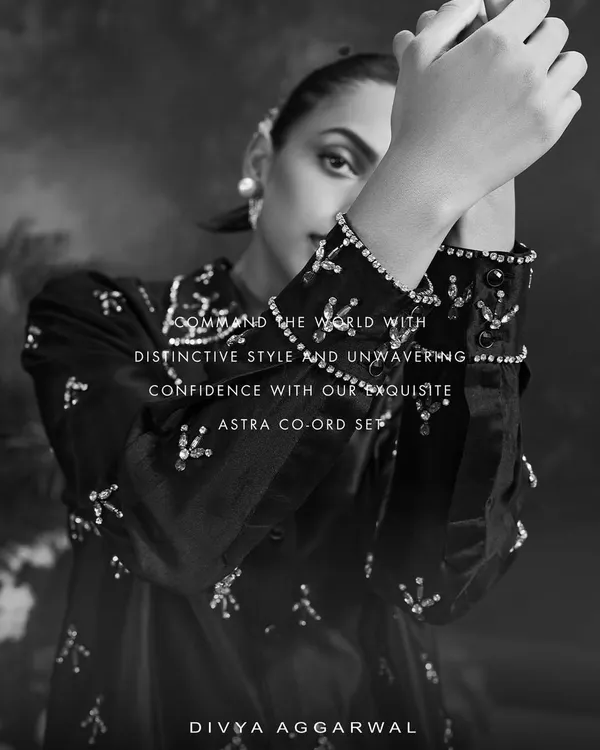 A black and white close-up of our Astra Co-ord Set, highlighting the intricate, shimmering embellishments on the cuffs and collar.