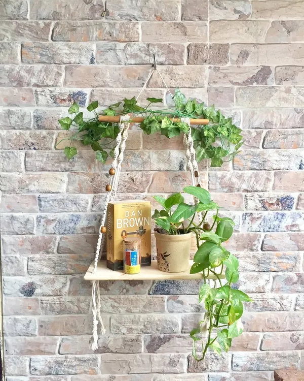 This is one of my favorite ways to use macrame. A simple hanging wall shelf adds so much life to a bare wall. It’s perfect for holding a small plant, a few books, or your favorite decorative items, bringing a touch of handmade warmth to your space.